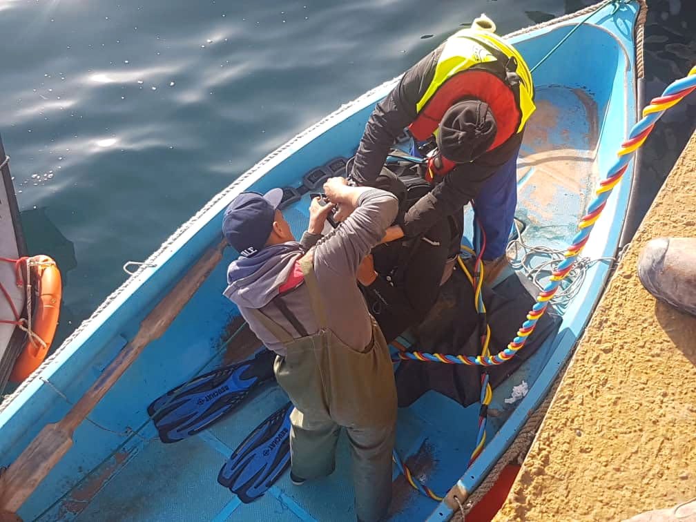 Scaphandrier sur le bassin